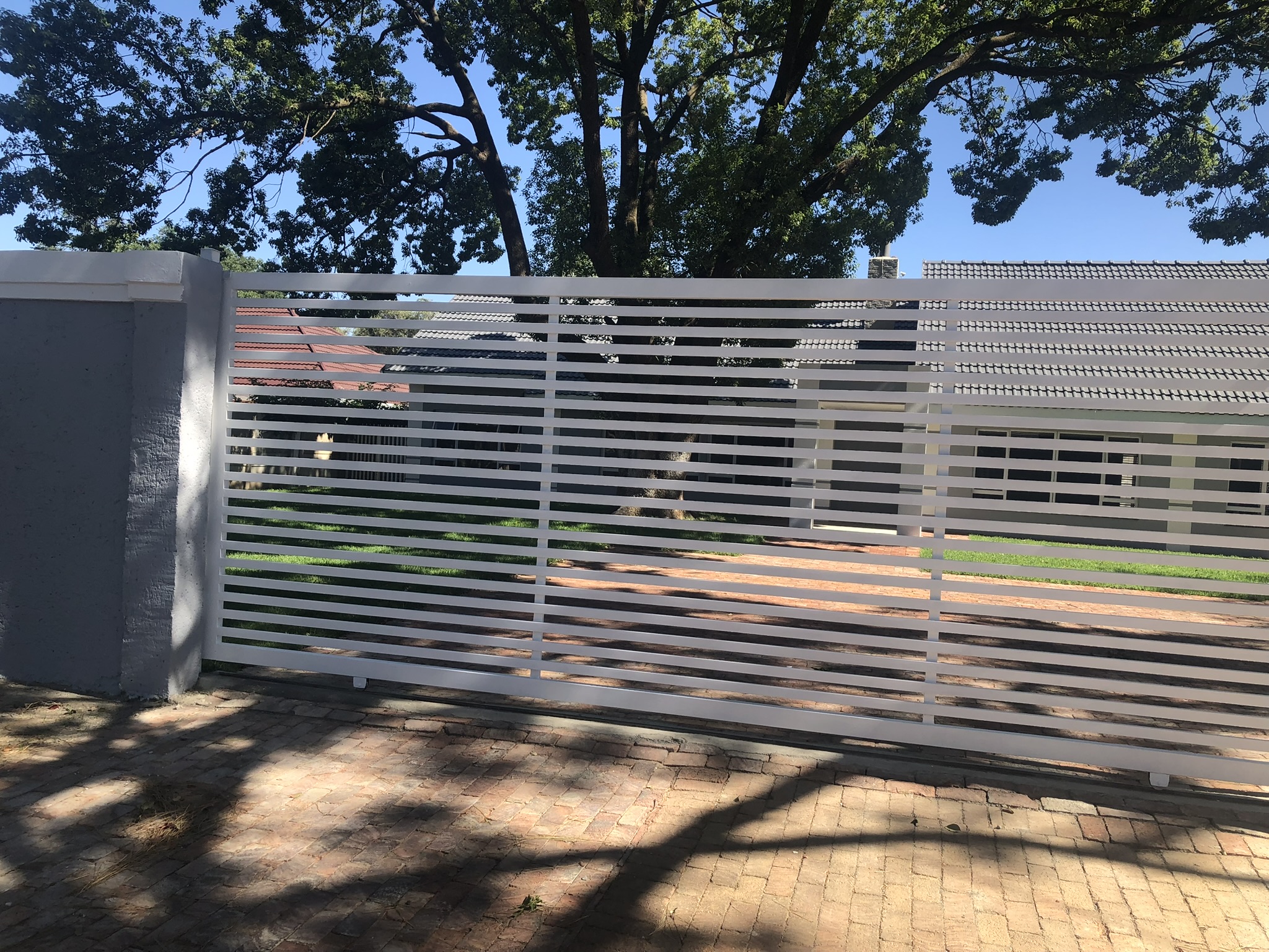 White Slat Driveway Gate